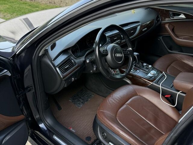 Синій Ауді А6, об'ємом двигуна 2 л та пробігом 187 тис. км за 18900 $, фото 4 на Automoto.ua