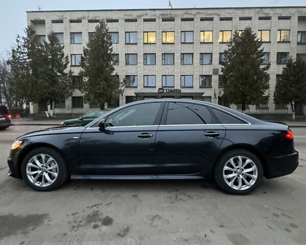 Синій Ауді А6, об'ємом двигуна 2 л та пробігом 235 тис. км за 15600 $, фото 3 на Automoto.ua