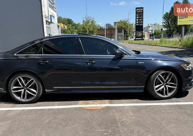 Синий Ауди А6, объемом двигателя 3 л и пробегом 77 тыс. км за 21999 $, фото 3 на Automoto.ua