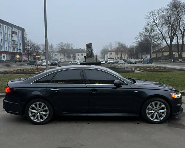 Синій Ауді А6, об'ємом двигуна 2 л та пробігом 235 тис. км за 15600 $, фото 2 на Automoto.ua