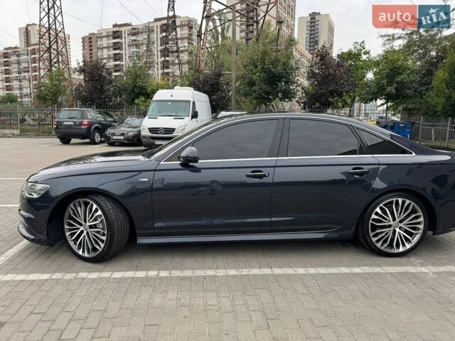 Синий Ауди А6, объемом двигателя 1.98 л и пробегом 130 тыс. км за 21500 $, фото 11 на Automoto.ua