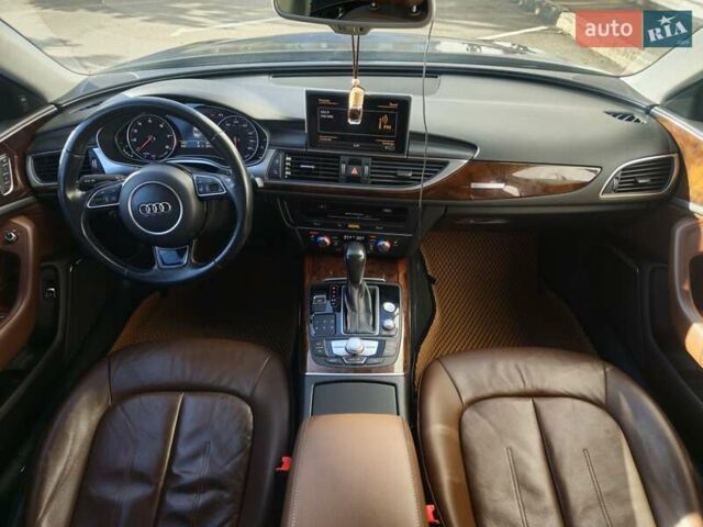 Синий Ауди А6, объемом двигателя 2 л и пробегом 185 тыс. км за 16700 $, фото 2 на Automoto.ua