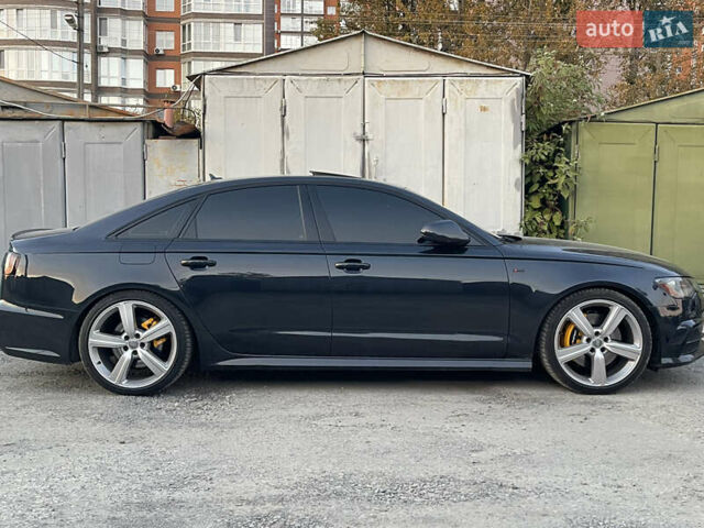 Синий Ауди А6, объемом двигателя 1.98 л и пробегом 206 тыс. км за 17800 $, фото 2 на Automoto.ua
