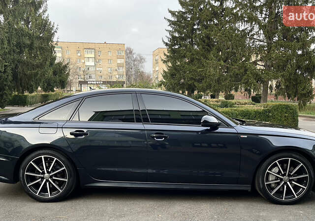 Синий Ауди А6, объемом двигателя 1.98 л и пробегом 129 тыс. км за 24000 $, фото 7 на Automoto.ua