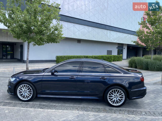 Синій Ауді А6, об'ємом двигуна 2 л та пробігом 149 тис. км за 24500 $, фото 4 на Automoto.ua