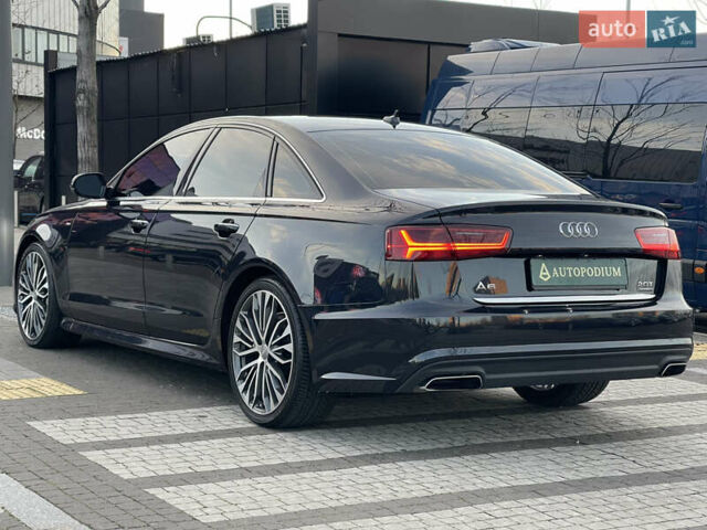 Синий Ауди А6, объемом двигателя 1.98 л и пробегом 59 тыс. км за 25600 $, фото 11 на Automoto.ua