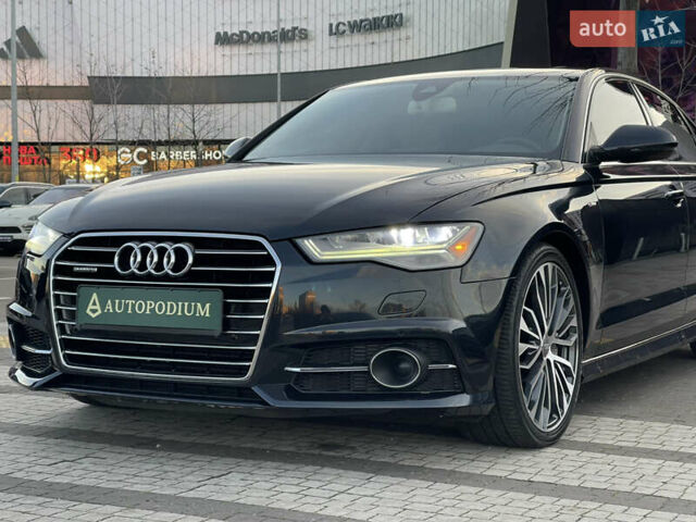 Синий Ауди А6, объемом двигателя 1.98 л и пробегом 59 тыс. км за 25600 $, фото 3 на Automoto.ua