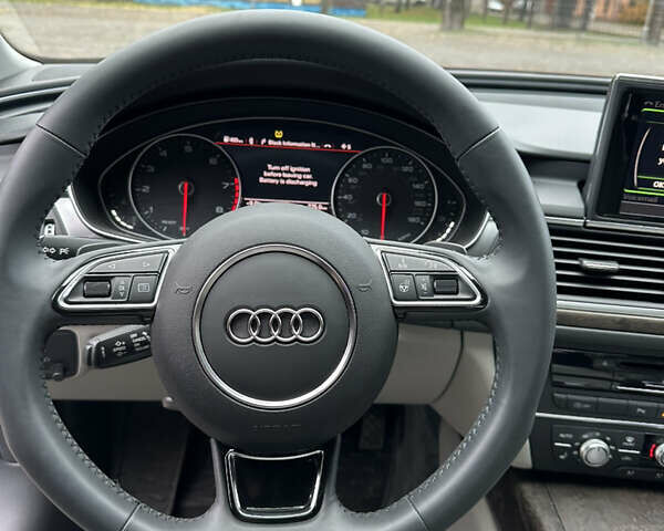 Синій Ауді А6, об'ємом двигуна 1.98 л та пробігом 214 тис. км за 18500 $, фото 10 на Automoto.ua