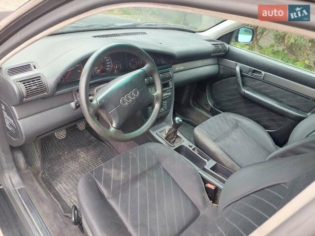 Синий Ауди А6, объемом двигателя 1.8 л и пробегом 345 тыс. км за 2500 $, фото 3 на Automoto.ua