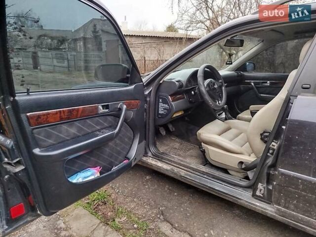 Синий Ауди А6, объемом двигателя 1.78 л и пробегом 554 тыс. км за 3500 $, фото 4 на Automoto.ua