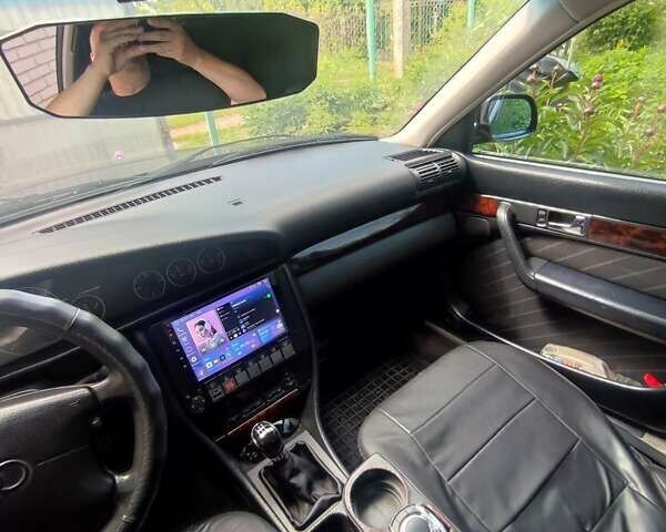 Синий Ауди А6, объемом двигателя 2.6 л и пробегом 352 тыс. км за 3790 $, фото 16 на Automoto.ua