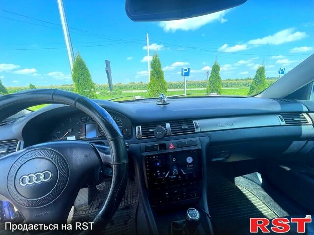 Синий Ауди А6, объемом двигателя 2.5 л и пробегом 236 тыс. км за 4600 $, фото 4 на Automoto.ua