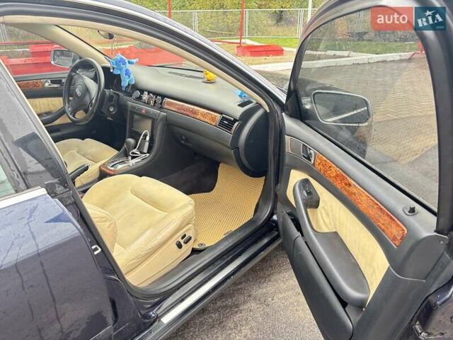 Синий Ауди А6, объемом двигателя 2.5 л и пробегом 315 тыс. км за 4350 $, фото 9 на Automoto.ua