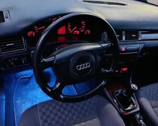 Синий Ауди А6, объемом двигателя 1.8 л и пробегом 205 тыс. км за 4999 $, фото 66 на Automoto.ua