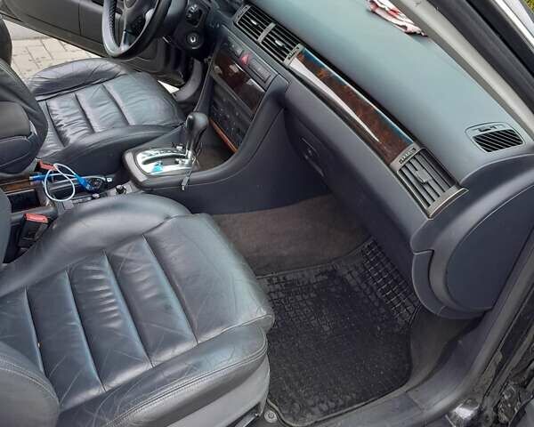 Синий Ауди А6, объемом двигателя 2.39 л и пробегом 400 тыс. км за 3500 $, фото 4 на Automoto.ua