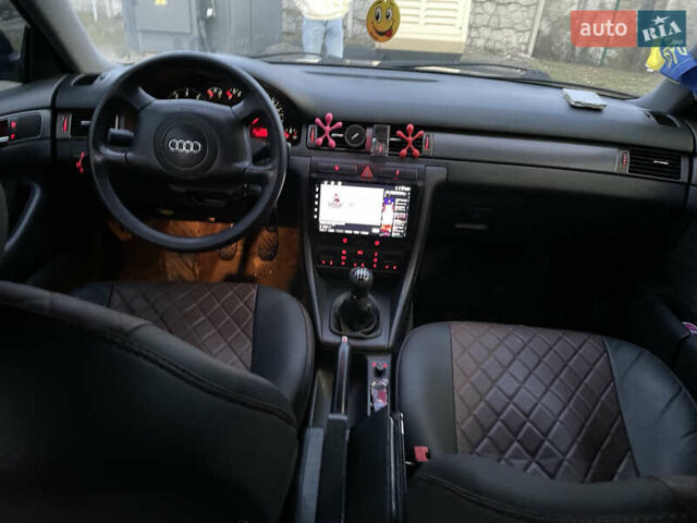 Синий Ауди А6, объемом двигателя 1.8 л и пробегом 305 тыс. км за 4600 $, фото 1 на Automoto.ua