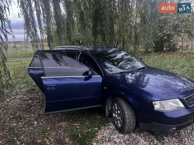 Синий Ауди А6, объемом двигателя 2.5 л и пробегом 356 тыс. км за 4600 $, фото 5 на Automoto.ua