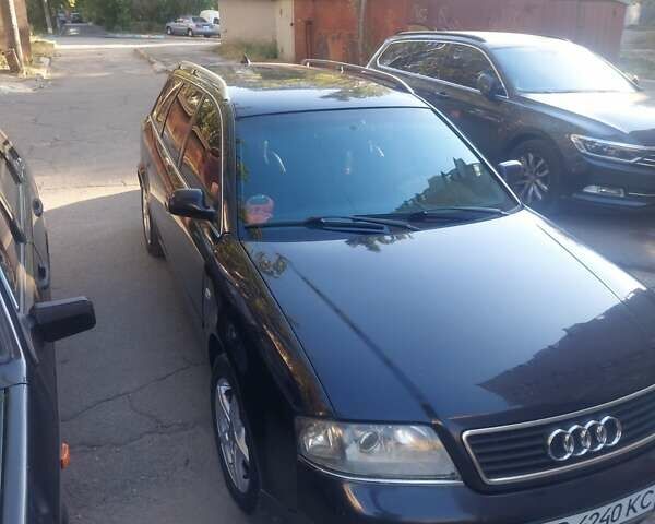 Синий Ауди А6, объемом двигателя 2.5 л и пробегом 300 тыс. км за 5000 $, фото 2 на Automoto.ua