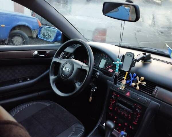 Синий Ауди А6, объемом двигателя 2.5 л и пробегом 420 тыс. км за 4500 $, фото 1 на Automoto.ua