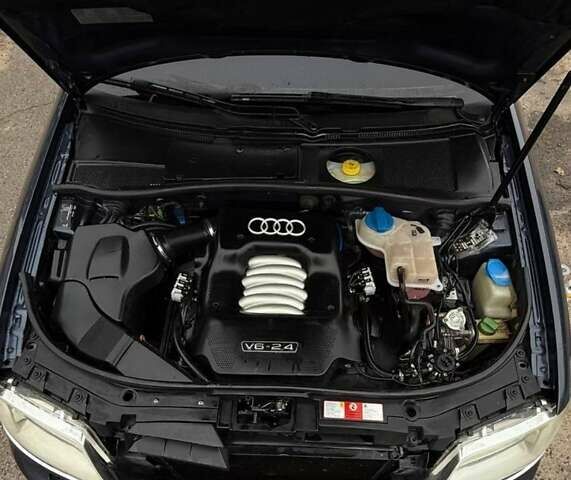 Синий Ауди А6, объемом двигателя 2.4 л и пробегом 311 тыс. км за 4750 $, фото 8 на Automoto.ua