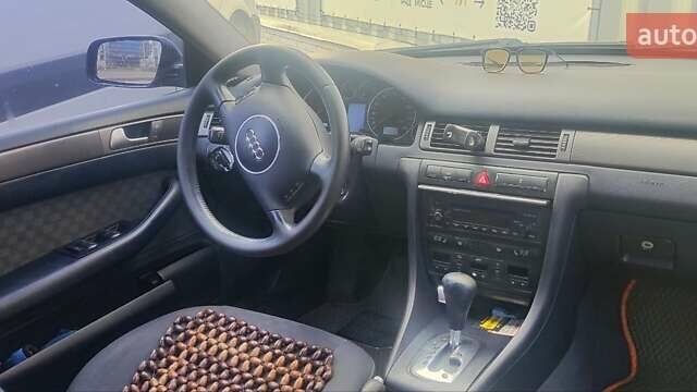 Синий Ауди А6, объемом двигателя 2.5 л и пробегом 300 тыс. км за 4400 $, фото 4 на Automoto.ua