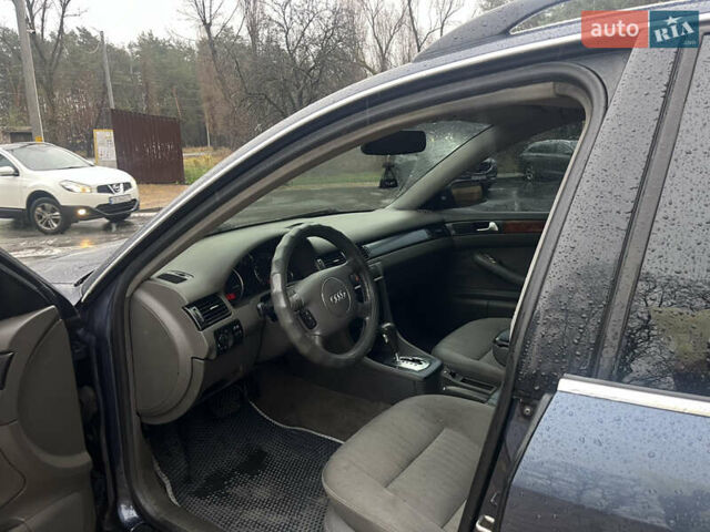 Синий Ауди А6, объемом двигателя 2.5 л и пробегом 300 тыс. км за 3599 $, фото 4 на Automoto.ua