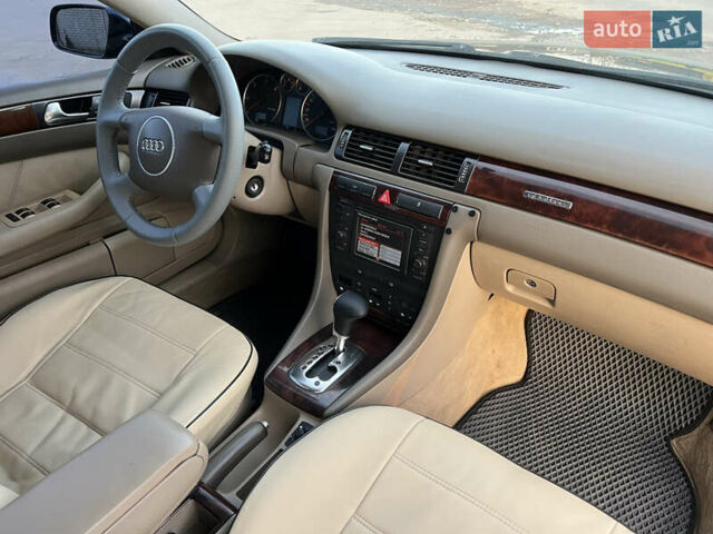 Синий Ауди А6, объемом двигателя 2.5 л и пробегом 375 тыс. км за 4999 $, фото 24 на Automoto.ua