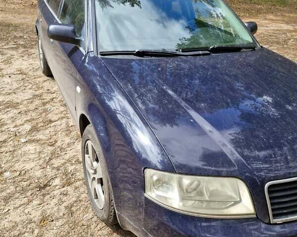 Синий Ауди А6, объемом двигателя 2.5 л и пробегом 343 тыс. км за 5500 $, фото 8 на Automoto.ua