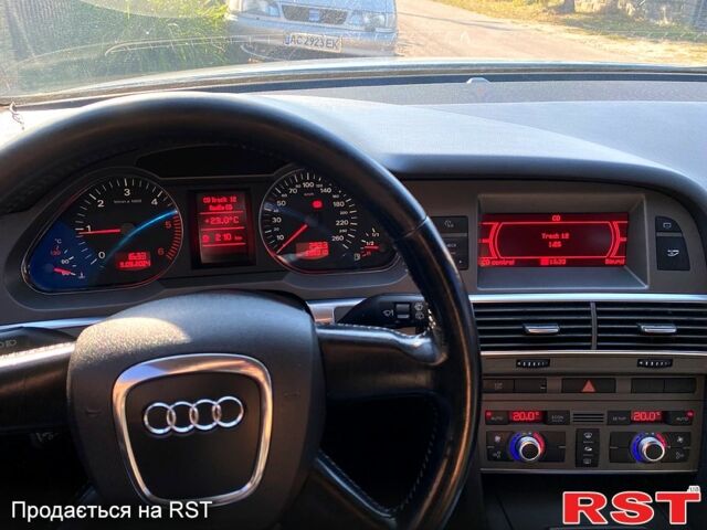 Синий Ауди А6, объемом двигателя 2 л и пробегом 285 тыс. км за 6600 $, фото 4 на Automoto.ua