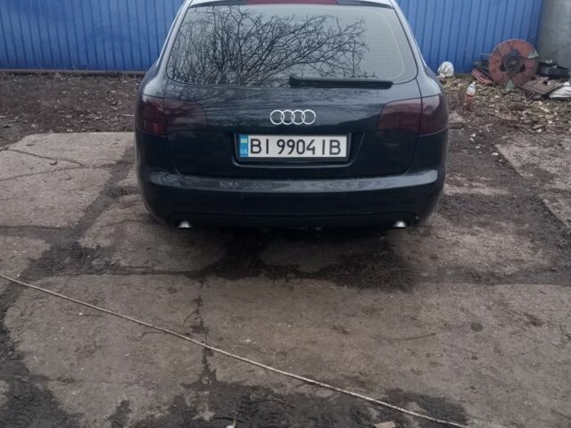 Синий Ауди А6, объемом двигателя 2 л и пробегом 370 тыс. км за 6999 $, фото 1 на Automoto.ua