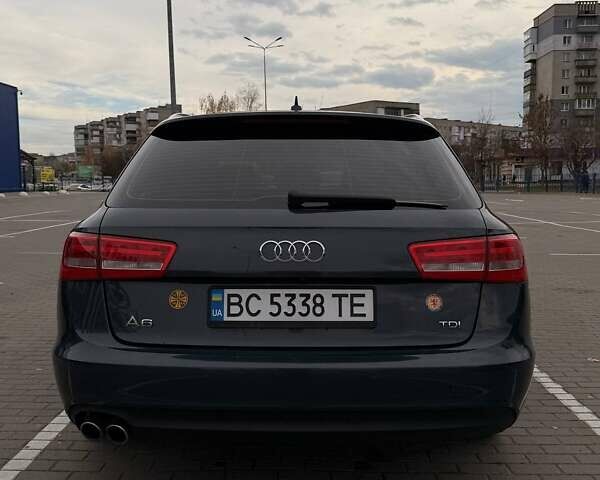 Синий Ауди А6, объемом двигателя 2 л и пробегом 315 тыс. км за 13800 $, фото 3 на Automoto.ua