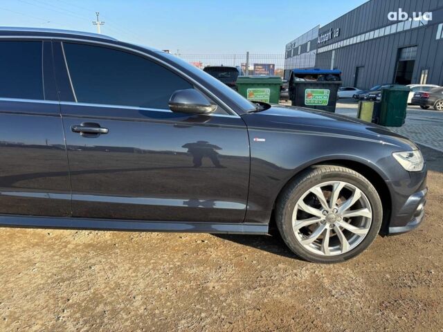 Синий Ауди А6, объемом двигателя 2 л и пробегом 277 тыс. км за 22790 $, фото 3 на Automoto.ua