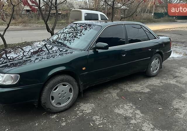 Зеленый Ауди А6, объемом двигателя 2.6 л и пробегом 285 тыс. км за 4000 $, фото 1 на Automoto.ua