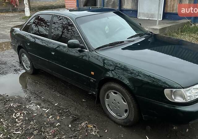 Зеленый Ауди А6, объемом двигателя 2.6 л и пробегом 285 тыс. км за 4000 $, фото 5 на Automoto.ua