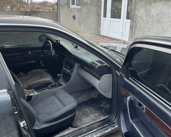 Зеленый Ауди А6, объемом двигателя 2.6 л и пробегом 400 тыс. км за 2999 $, фото 5 на Automoto.ua