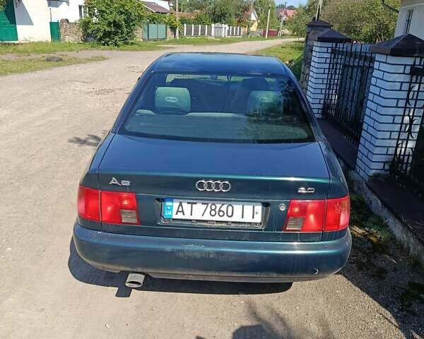 Зеленый Ауди А6, объемом двигателя 2 л и пробегом 282 тыс. км за 3100 $, фото 2 на Automoto.ua