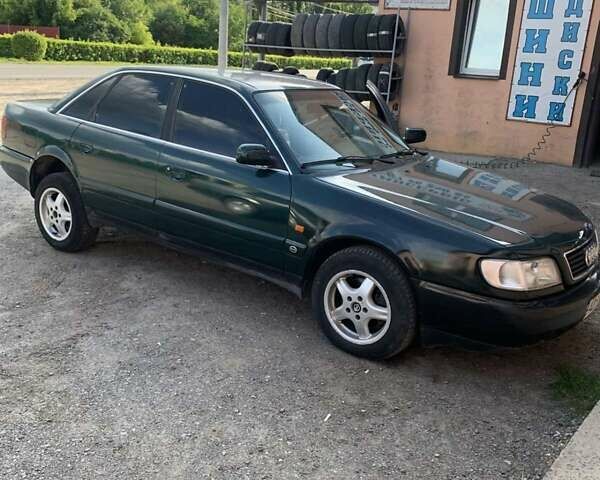 Зеленый Ауди А6, объемом двигателя 2.6 л и пробегом 320 тыс. км за 1350 $, фото 1 на Automoto.ua