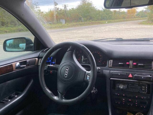 Зеленый Ауди А6, объемом двигателя 2.8 л и пробегом 350 тыс. км за 3750 $, фото 4 на Automoto.ua