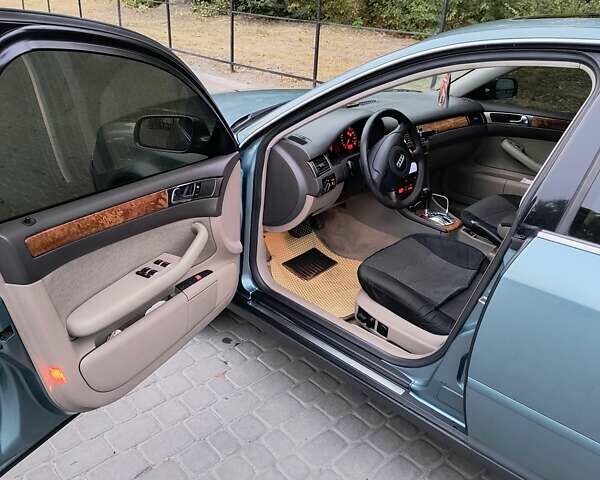 Зеленый Ауди А6, объемом двигателя 2.39 л и пробегом 265 тыс. км за 4600 $, фото 5 на Automoto.ua