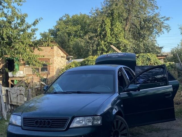 Зеленый Ауди А6, объемом двигателя 2.4 л и пробегом 444 тыс. км за 2750 $, фото 1 на Automoto.ua