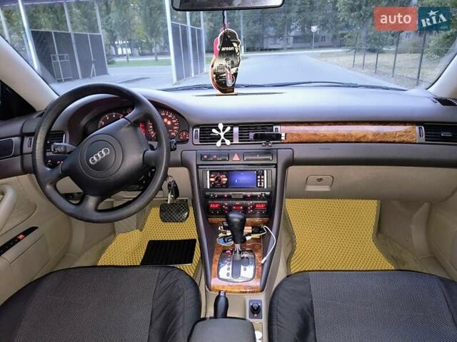 Зеленый Ауди А6, объемом двигателя 2.39 л и пробегом 265 тыс. км за 4600 $, фото 11 на Automoto.ua