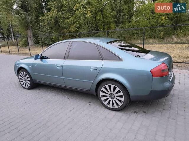 Зеленый Ауди А6, объемом двигателя 2.39 л и пробегом 265 тыс. км за 4600 $, фото 1 на Automoto.ua