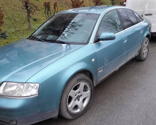 Зеленый Ауди А6, объемом двигателя 2.4 л и пробегом 225 тыс. км за 3500 $, фото 1 на Automoto.ua