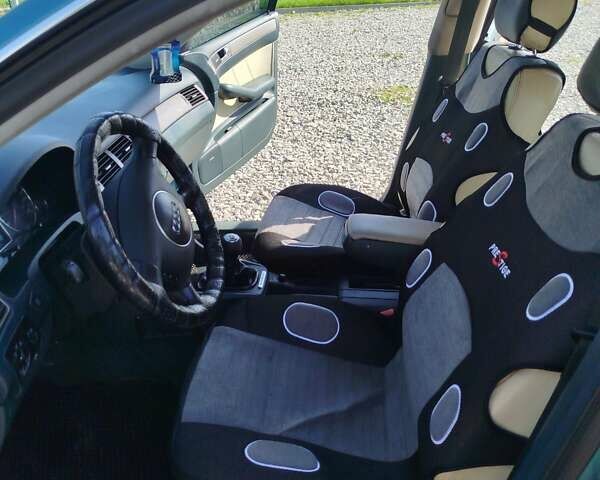 Зеленый Ауди А6, объемом двигателя 1.78 л и пробегом 275 тыс. км за 4400 $, фото 4 на Automoto.ua