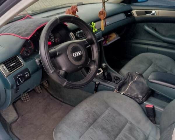 Зеленый Ауди А6, объемом двигателя 2.4 л и пробегом 318 тыс. км за 3500 $, фото 5 на Automoto.ua