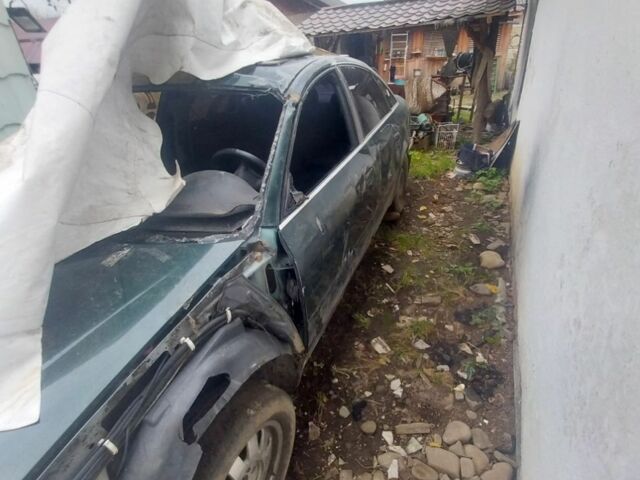 Зеленый Ауди А6, объемом двигателя 1.8 л и пробегом 200 тыс. км за 1600 $, фото 1 на Automoto.ua