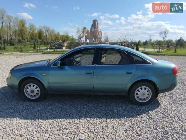 Зеленый Ауди А6, объемом двигателя 1.78 л и пробегом 275 тыс. км за 4400 $, фото 1 на Automoto.ua