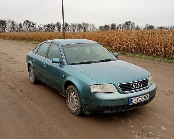 Зеленый Ауди А6, объемом двигателя 2.5 л и пробегом 350 тыс. км за 3500 $, фото 1 на Automoto.ua