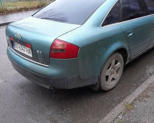 Зеленый Ауди А6, объемом двигателя 2.4 л и пробегом 225 тыс. км за 3500 $, фото 2 на Automoto.ua