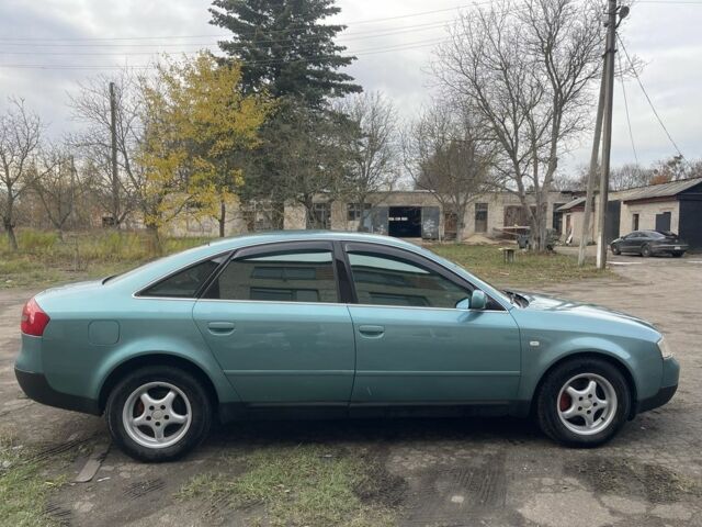 Ауді А6 1999 у Радомышле на Automoto.ua Зелений Ауді А6, об'ємом двигуна 1.8 л та пробігом 335 тис. км за 4000 $, фото 7 на Automoto.ua